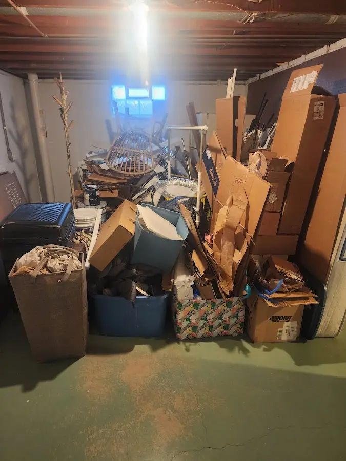 Roll-off dumpster container at job site for Yard Waste Dumpster Rental in Wolfeboro